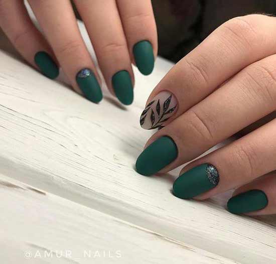 Dark green autumn manicure with a leaf