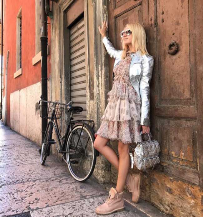 Yana Rudkovskaya and a silver backpack