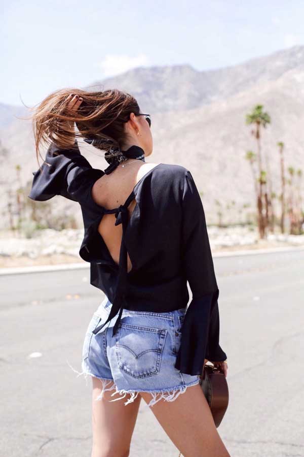 Blouse with cutout and denim shorts