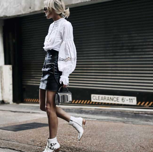 Blouse + leather mini skirt