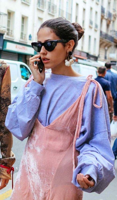 Pink dress over a blue sweater