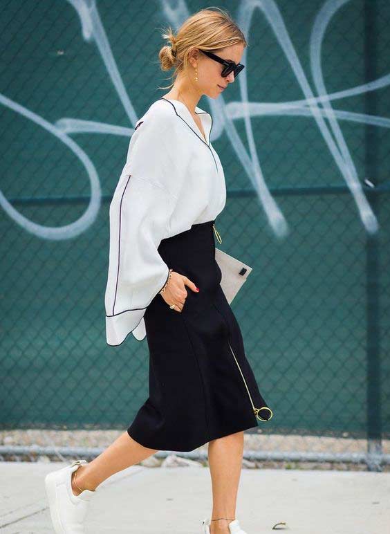 White shirt and fashionable skirt with zipper