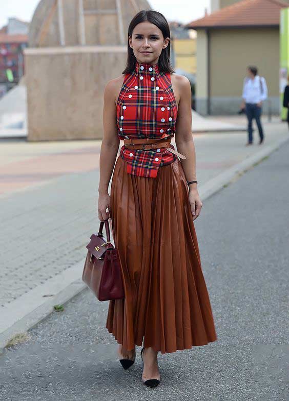 Miroslava Duma in a pleated skirt