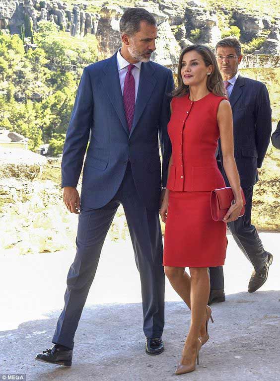 Red skirt suit + beige shoes