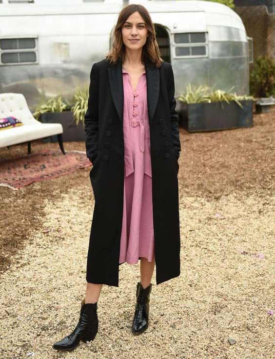 Black cloak + ankle boots + pink dress