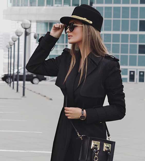 Dark trench coat and shoulder bag