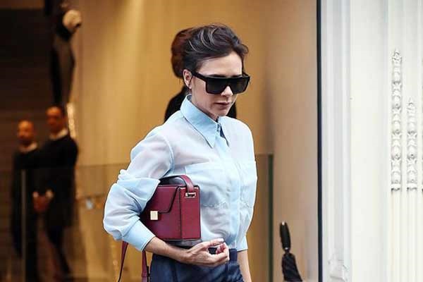 Office blouse plus tiered skirt: new images of Victoria Beckham