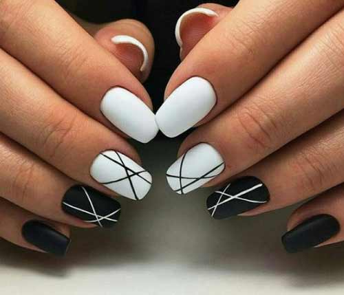 Black manicure with graphics