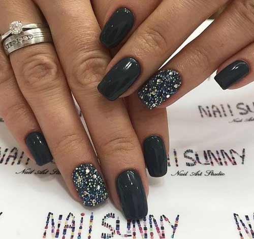 Black with rhinestones manicure