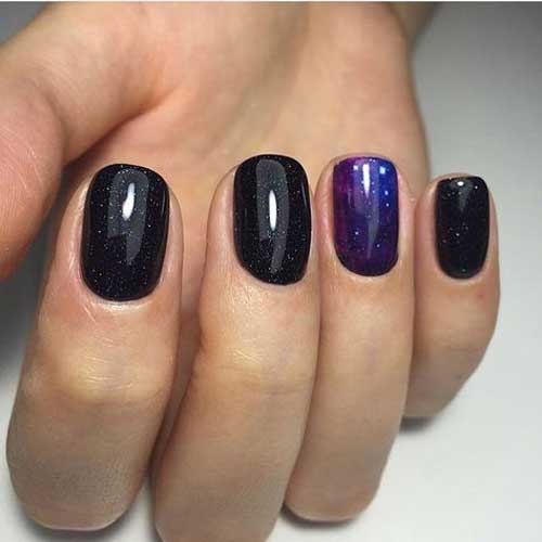 Black manicure with an accent on one finger