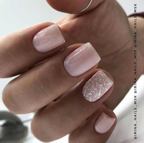 Nude strict manicure with flakes decor