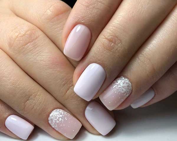 Manicure with light pink gel polish