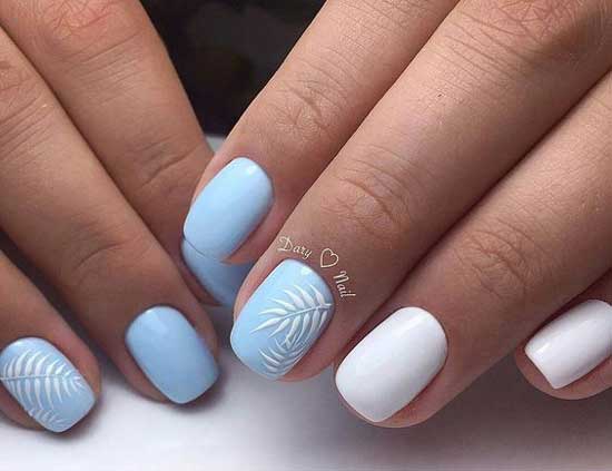 Blue + white design in manicure