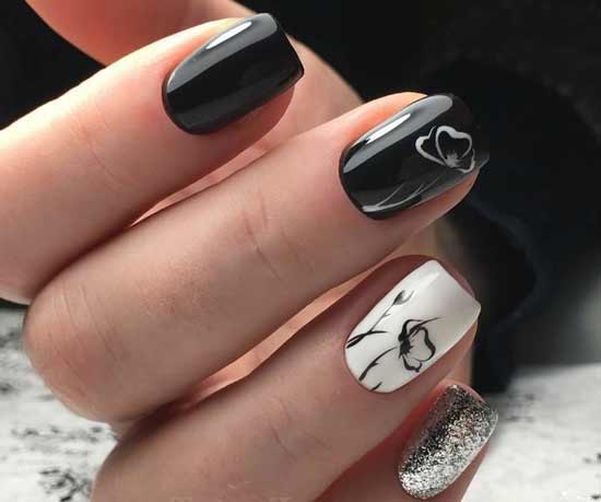 Black manicure with white pattern