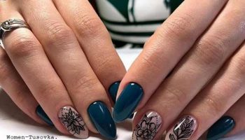 Dark green color manicure with a pattern