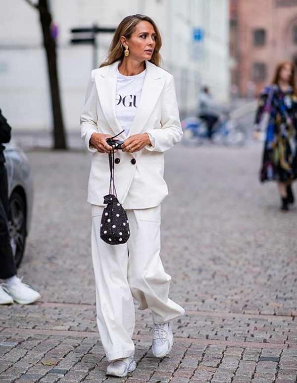 White suit with chunky sneakers