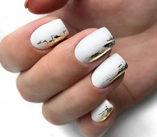 White + gold in manicure