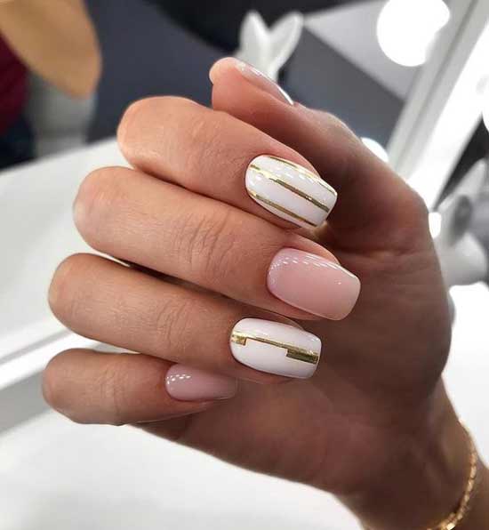 White + gold winter manicure