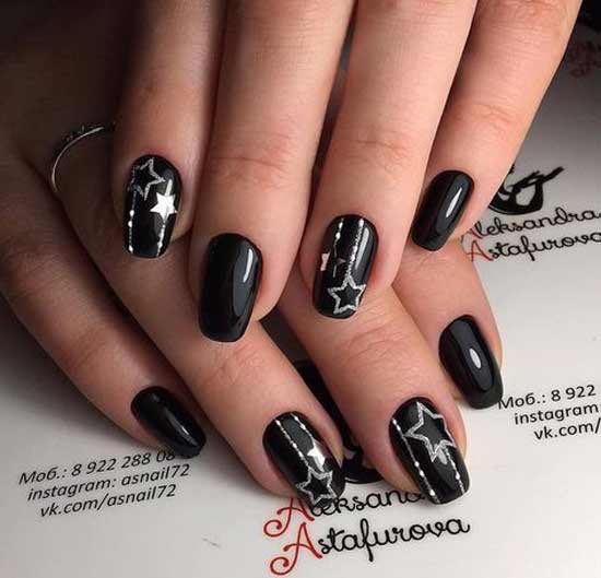 Manicure silver stars on a black background