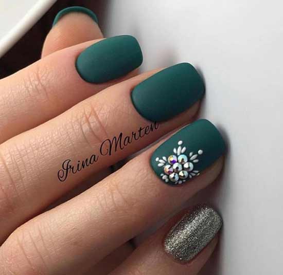 Green manicure and rhinestones