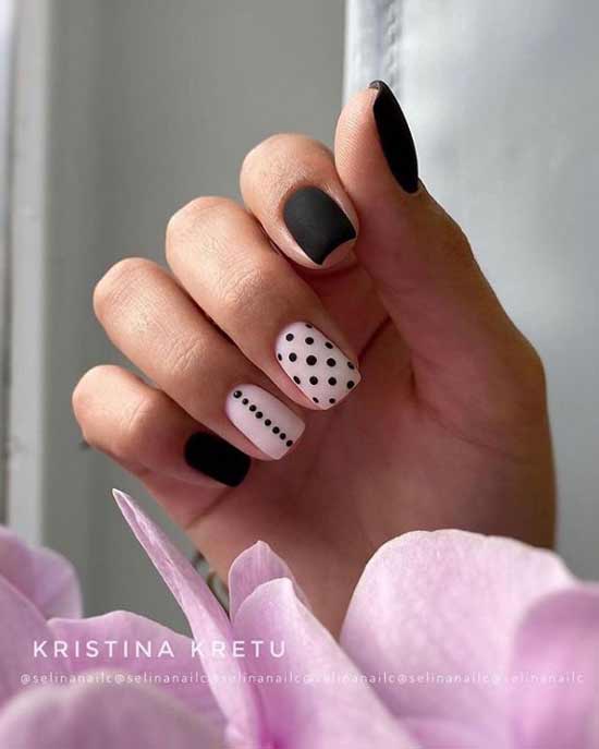 Black polka dot print manicure