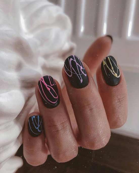 Black manicure with spiderweb