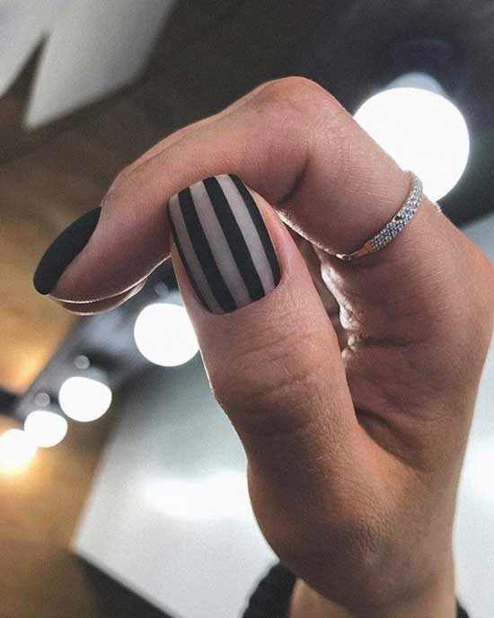 Black striped manicure