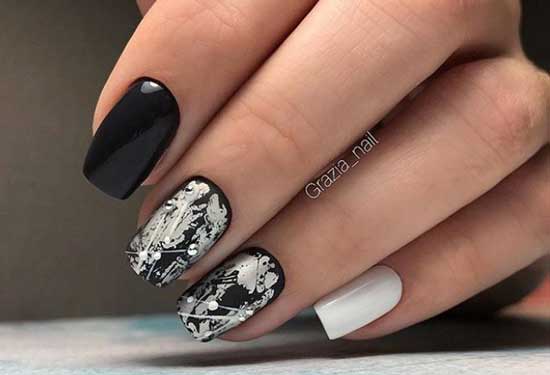 Black winter manicure with foil