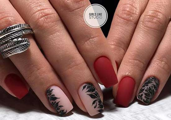 Deep red manicure with black decor