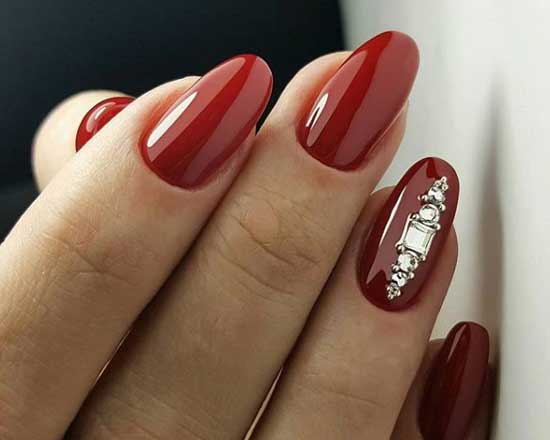 Red + rhinestones in manicure