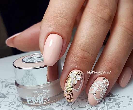 Festive nail design in a nude palette