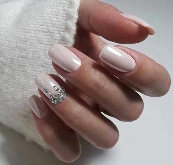 Nude and rhinestones - festive manicure