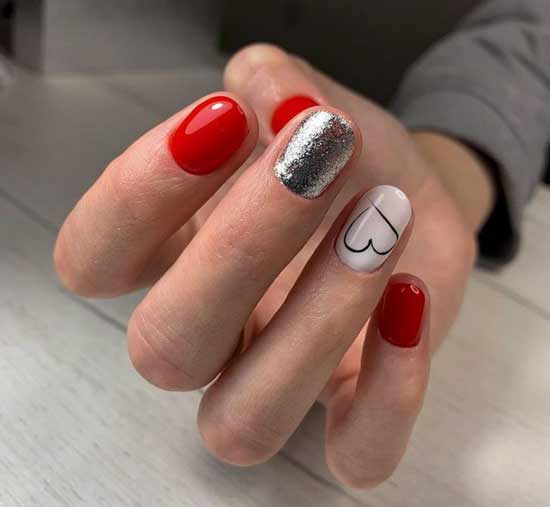 Red manicure for February 14 with a heart