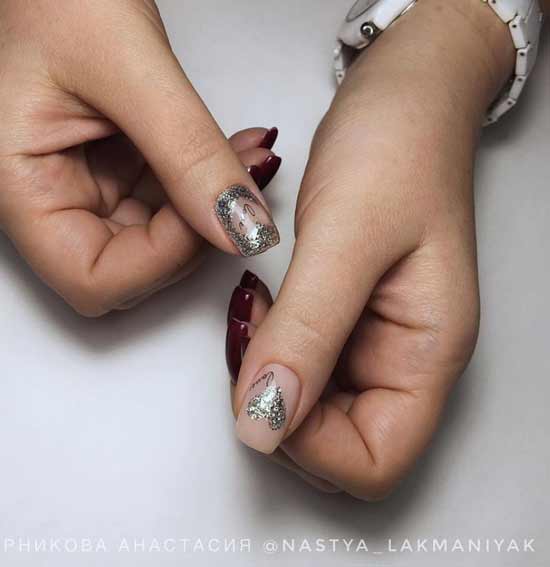 Silver heart on nails