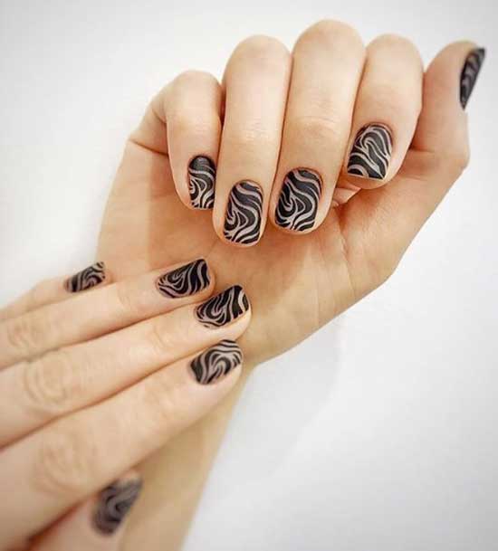 Nail design with trendy zebra print