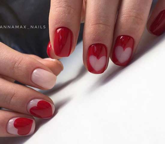 Red manicure with hearts for March 8