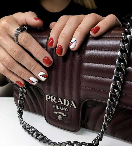 Bright red manicure combination with white