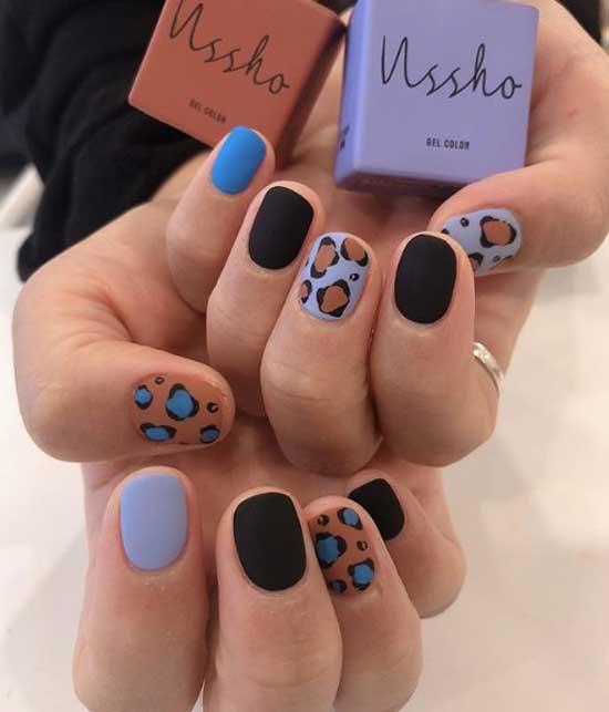 Multicolored cow print on nails