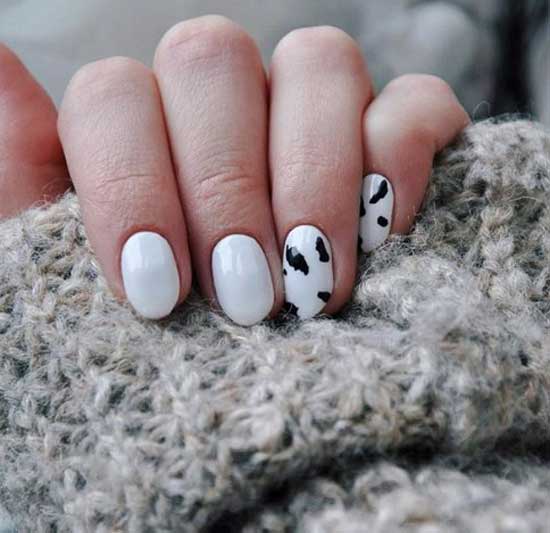 Black and white manicure cow print