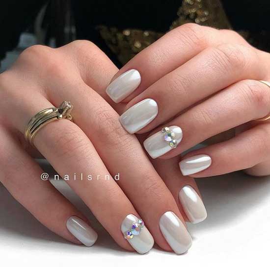 Pearl manicure with rhinestones