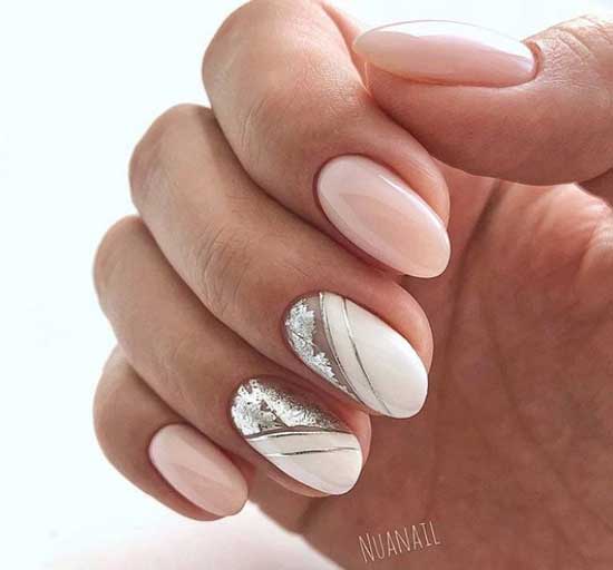 Beige manicure with silver stripes