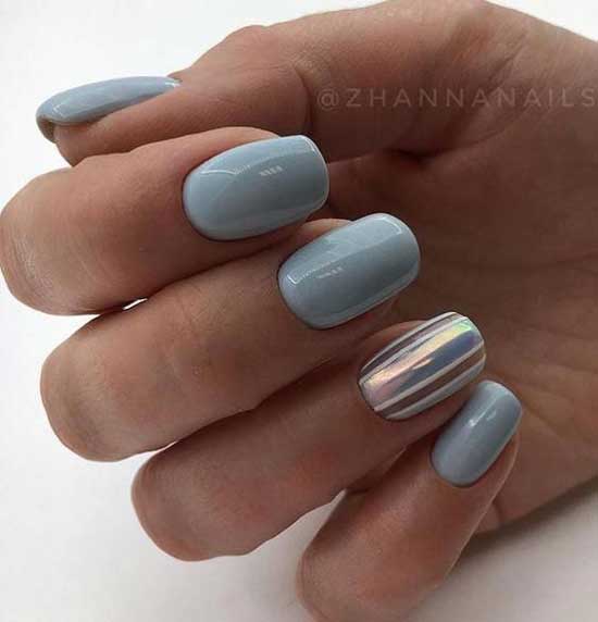 Blue manicure with stripes