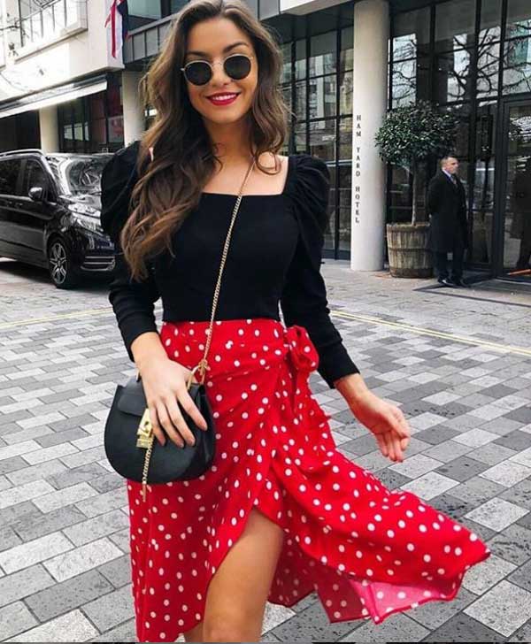 Girl in a skirt with polka dots