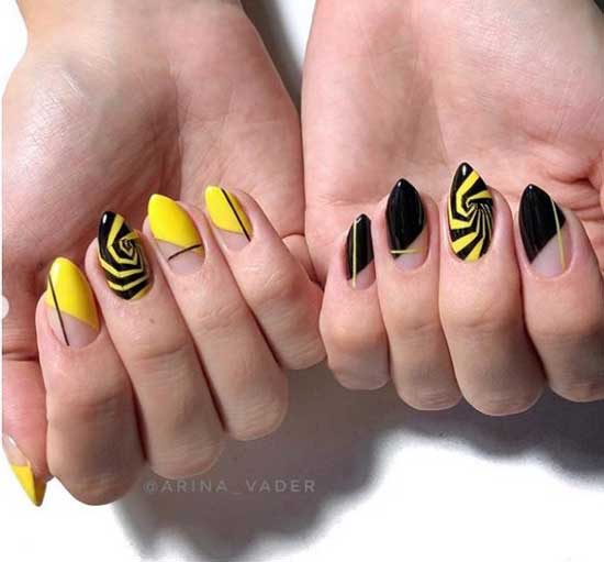 Manucure noire et jaune sur les ongles