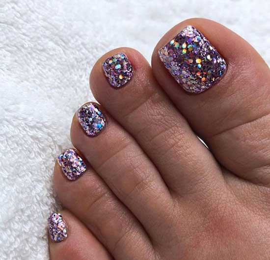 Summer pedicure with glitter