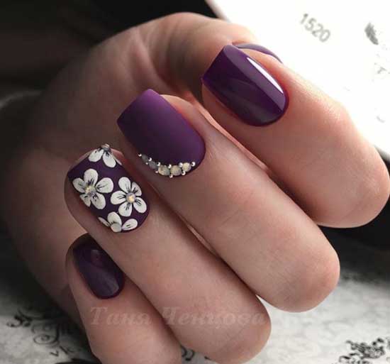 Purple manicure with rhinestones