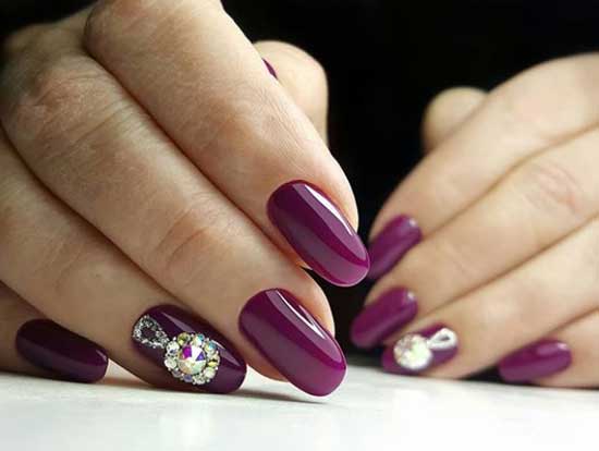 Shiny ball on nails made of rhinestones