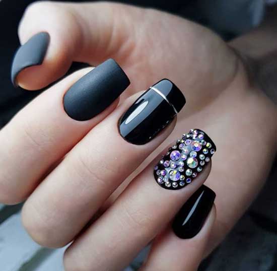 Black manicure with rhinestones