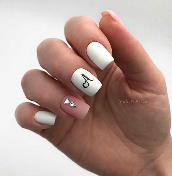 White manicure with rhinestones