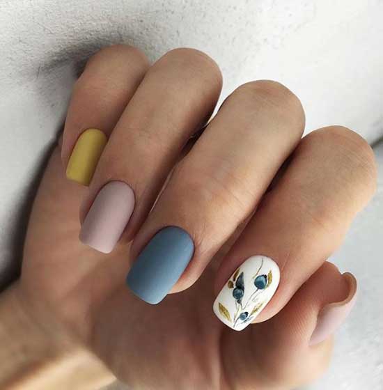 Multi-colored manicure and neat drawing